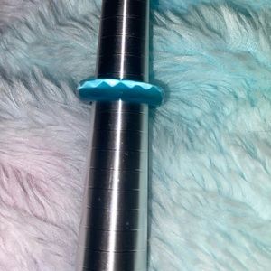 Teal carved ring